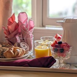 Monarch Cove Inn - Breakfast of fruit, pastries, and juice