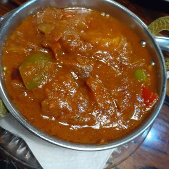 Highway Host - a bowl of curry on a table - Canadian (New) Near Me - Rosetown, Saskatchewan
