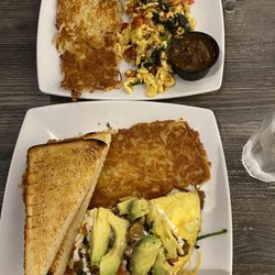 Manny's Place - Egg scrambles (top surfer and bottom kitchen sink) with hash browns and sourdough toast.