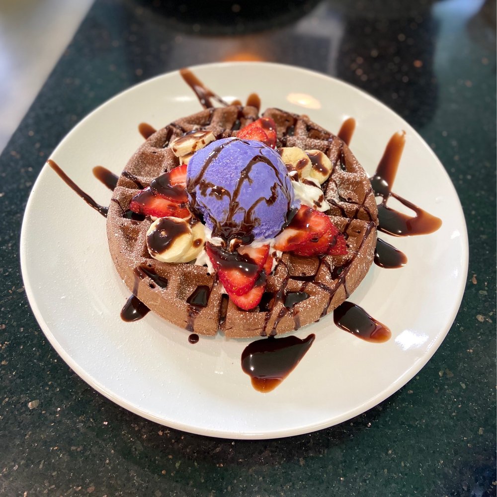 Fresh Bites Hawaii - Brownie mochi waffle with ube ice cream, strawberries, and bananas - Poke Near Me - Honolulu, Hawaii Fresh Bites Hawaii - Brownie mochi waffle with ube ice cream, strawberries, and bananas - Poke Near Me - Honolulu, Hawaii