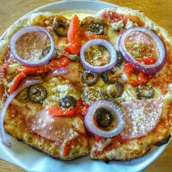 MOD Pizza - Mini crust mod pizza with chicken, anchovies, chicken jalapeno sausage, canadian bacon, olives, roasted red peppers, onions, and mozzarella - Pizza Near Me - Lacey, Washington