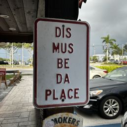 a sign that reads dis must be da place