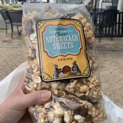 Kilwins - Nicely packaged for traveling with whole pecans and almonds. $24