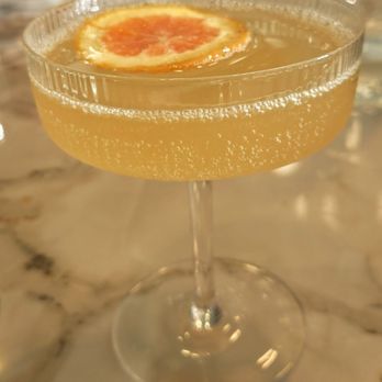 Slip 53 - The Sip 53... vodka, lime juice, passion fruit & champagne. FRESH! - Seafood Near Me - Columbia, South Carolina