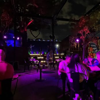 Pilo’s Tequila Garden - people sitting at tables with neon lights - Dance Clubs Near Me - Miami, Florida Pilo’s Tequila Garden - people sitting at tables with neon lights - Dance Clubs Near Me - Miami, Florida