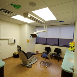 Gramercy Pediatric Dentistry - Treatment rooms with TV's and treasure chests.