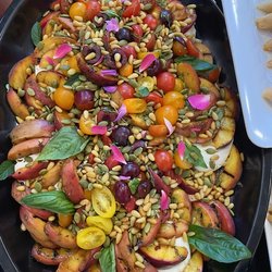 Gayle Orth Catering - Exquisite salad of grilled peaches, heirloom tomatoes, summer cherries and fresh herbs.