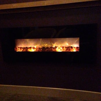 Massage Envy - Nice cozy fireplace insert in the massage waiting area. Gives a nice ambiance. - Massage Therapy Near Me - Cincinnati, Ohio Massage Envy - Nice cozy fireplace insert in the massage waiting area. Gives a nice ambiance. - Massage Therapy Near Me - Cincinnati, Ohio