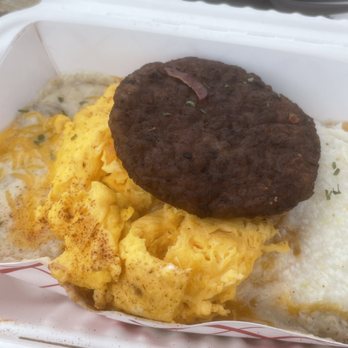 Biscuit Bitch - Gritty scrambled cheesy bitch with an added sausage patty x2 - Breakfast & Brunch Near Me - Seattle, Washington