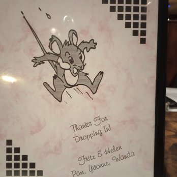 The Haven - a drawing of a cartoon mouse - A thank you note printed on a pink marbled background features a cartoon dog illustration in the upper left corner, with a playful expression and a leash. The message reads, "Thanks For Dropping In!" followed by "Fritz & Helen Pam, Yvonne, Wanda" in a handwritten-style font. Black square patterns are positioned in the upper right and lower left corners, framing the note. - Pizza Near Me - Rhinelander, Wisconsin