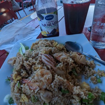 Brazas Chicken - Peruvian seafood chaufa with Chica Mirada to drink. - Peruvian Near Me - Orlando, Florida