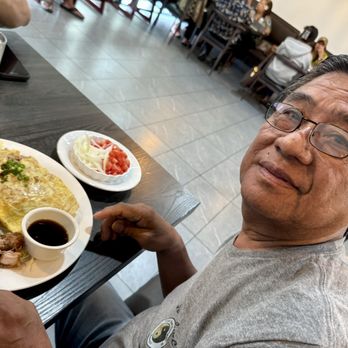 Jessica's - My husband Armando ordered Adobo Fried Rice with Lechon Kawali - Breakfast & Brunch Near Me - Aiea, Hawaii