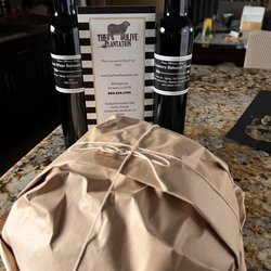 The Olive Plantation - Fresh baked sourdough bread and 2 bottles of vinegar! Cranberry and white peach.
