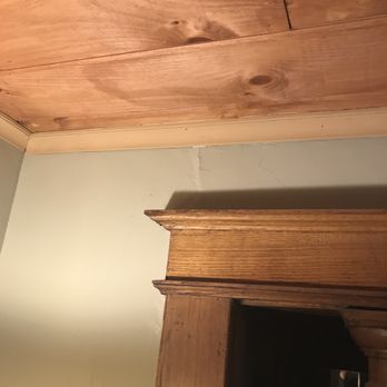 Sequence Home Improvement - Molding reinstalled with hammer mark and large gaps. - Flooring Near Me