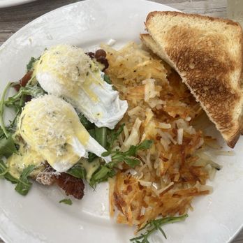Shorehouse Kitchen - Crispy Parmesan risotto and honey cured bacon Benedict. The best one on the menu - Breakfast & Brunch Near Me - Carlsbad, California Shorehouse Kitchen - Crispy Parmesan risotto and honey cured bacon Benedict. The best one on the menu - Breakfast & Brunch Near Me - Carlsbad, California