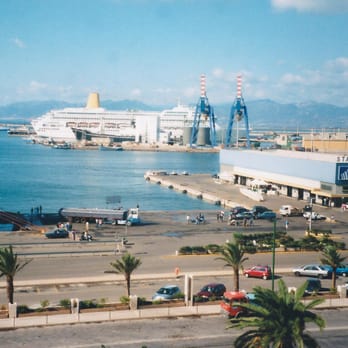 Porto di Cagliari - The Stazione Marittima building, with one of the daily Tirrenia ferries to the mainland (left) and a P&O cruise ship (beyond). - Public Services & Government Near Me - Cagliari, California