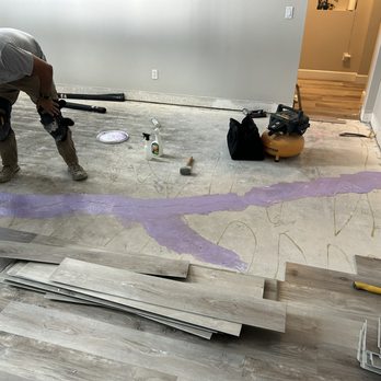 Tile Metrics - repair work is being completed by cleaning the floors, filling cracks and applying moisture barrier. - Flooring Near Me - Oviedo, Florida Tile Metrics - repair work is being completed by cleaning the floors, filling cracks and applying moisture barrier. - Flooring Near Me - Oviedo, Florida