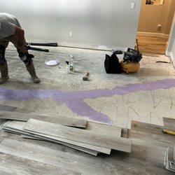Tile Metrics - Repair work is being completed by cleaning the floors, filling cracks and applying moisture barrier.