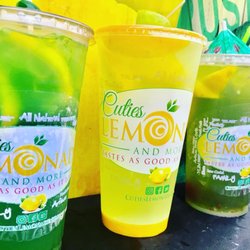 Cuties Lemonade and More - Green-Green Lemonades made with Crushed Meyer Lemons mixed with Sour Apple Mix and Kiwi Green and a spritz of sour mix