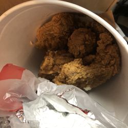 KFC - Chicken bucket in the garbage because it was trash.