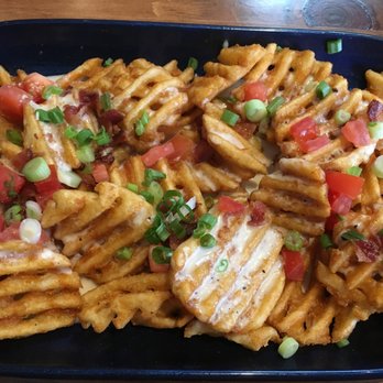 Hook & Barrel - Frachos (seasoned waffle fries, hickory bacon, feta cream sauce, spring onions) - Seafood Near Me - Myrtle Beach, South Carolina