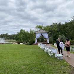 The Club At Garden Ridge - Setting up outside with fountain in backdrop