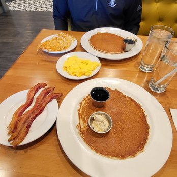 The Buttered Tin - Single pancake with bacon and double order of pancakes, eggs and hash browns. Delicious! - Breakfast & Brunch Near Me - Minneapolis, Minnesota