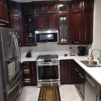 Kitchen & Bath Specialists - a kitchen with stainless steel appliances - General Contractors Near Me - Warrenton, Virginia Kitchen & Bath Specialists - a kitchen with stainless steel appliances - General Contractors Near Me - Warrenton, Virginia