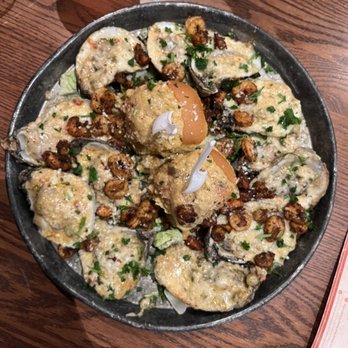 Mambo’s - Mambo's Famous Oysters (topped with shrimp and crawfish) - Cajun/Creole Near Me - New Orleans, Louisiana Mambo’s - Mambo's Famous Oysters (topped with shrimp and crawfish) - Cajun/Creole Near Me - New Orleans, Louisiana