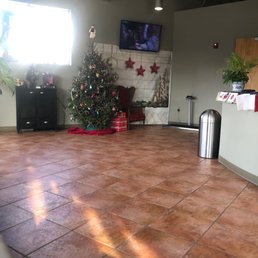 Lobby area is clean and festive . Lobby area is clean and festive .