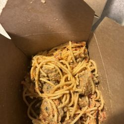 Sugo's Spaghetteria - Chopped up burger ball with thin tomato sauce