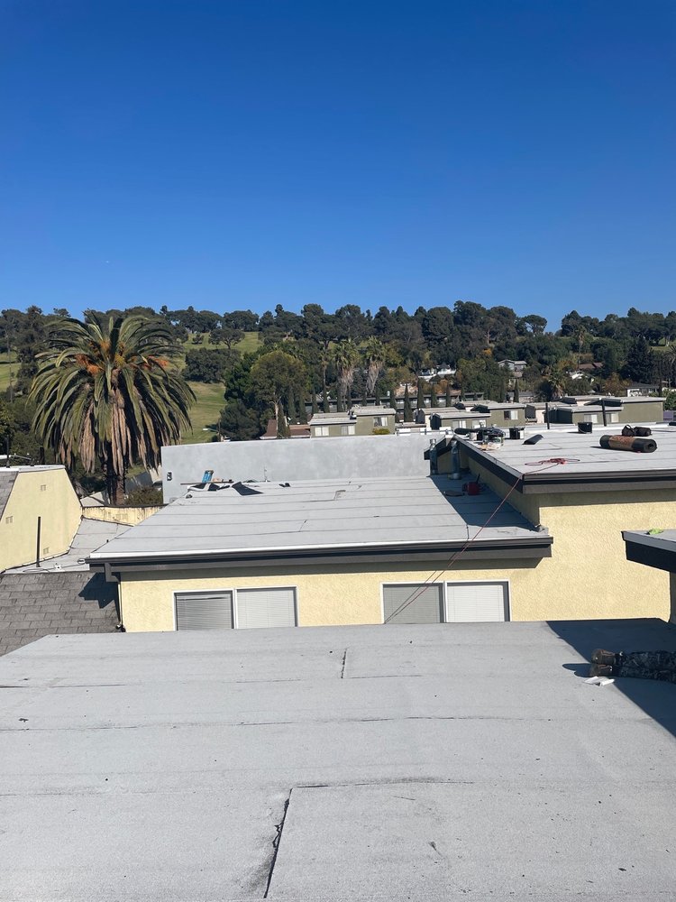 Slide of Marco Roofing