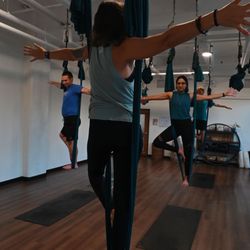 Myriad Health Fitness - There is never a dull moment in Aerial Yoga.