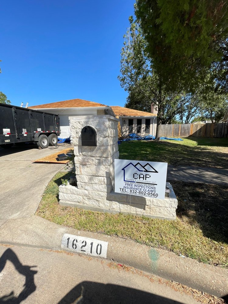 Slide of CAP Roofing and Construction