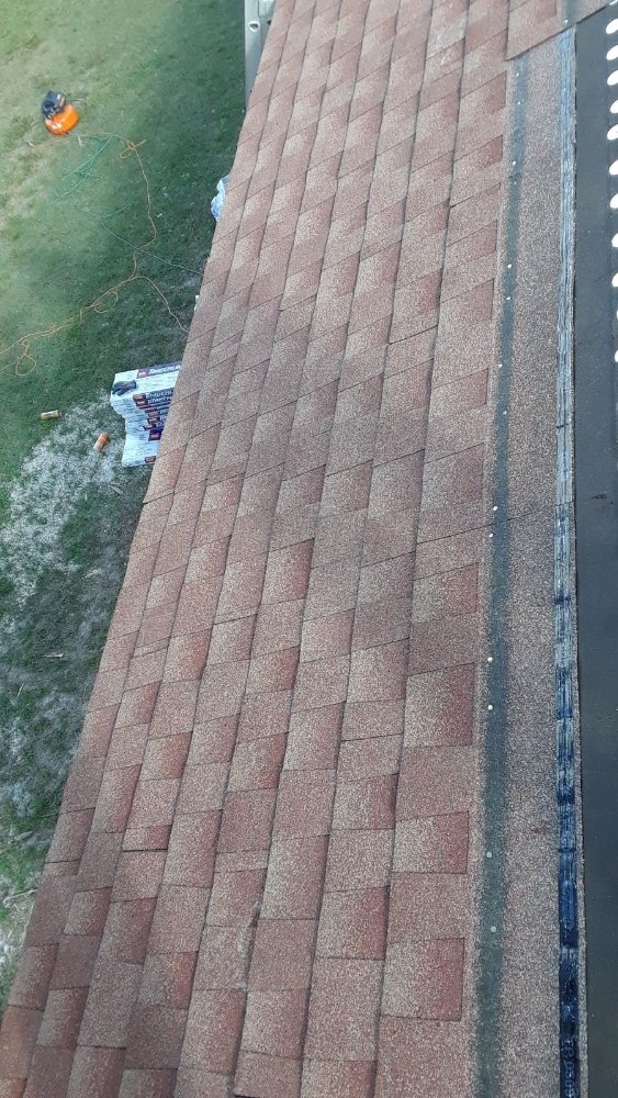 Slide of Extra Myles Roofing