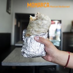 Monarca Mexican Restaurant - Deluxe Breakfast Burrito! Comes with eggs, potato, bacon, onions and cheese!