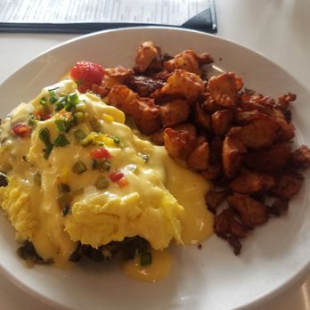 Four Friends Kitchen - The bluegrass benedict is so good that if this were an old movie, after eating it you'd have to smoke a cigarette. - Southern Near Me - Denver, Colorado
