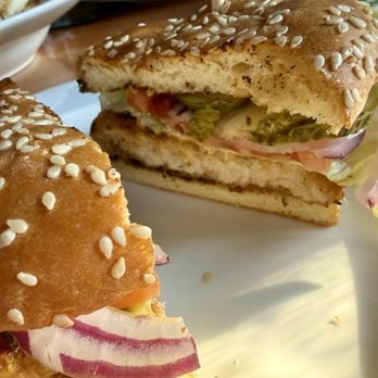 Montana Ale Works - Tender lightly beer-battered local Hutterite pork chop sandwich, with honey-mustard, lettuce, tomato, onion, pickle - New American Near Me - Bozeman, Montana