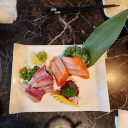 Salmon $12.00 and Hamachi $16.50 Sashimi in 2023.