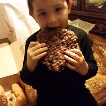 Friendly Donut House - The apply fritter is as large as his head! - Donuts Near Me - Henderson, Nevada Friendly Donut House - The apply fritter is as large as his head! - Donuts Near Me - Henderson, Nevada