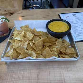 Spirits of Old Town - The delicious and refreshing Giggle Water cocktail and a plate of nachos y queso that we devoured but still wanted more! - Bars Near Me - Albuquerque, New Mexico Spirits of Old Town - The delicious and refreshing Giggle Water cocktail and a plate of nachos y queso that we devoured but still wanted more! - Bars Near Me - Albuquerque, New Mexico