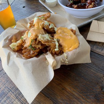 Sideshow Kitchen - Garlic Cheese Fries  Lemon Pepper/Barbecue Wings - Burgers Near Me - Oakland, California