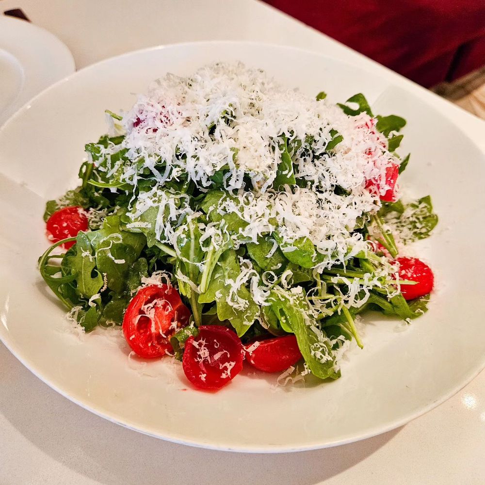 Sofia - a plate of salad with tomatoes and parmesan cheese - Italian Near Me - Toronto, Ontario Sofia - a plate of salad with tomatoes and parmesan cheese - Italian Near Me - Toronto, Ontario
