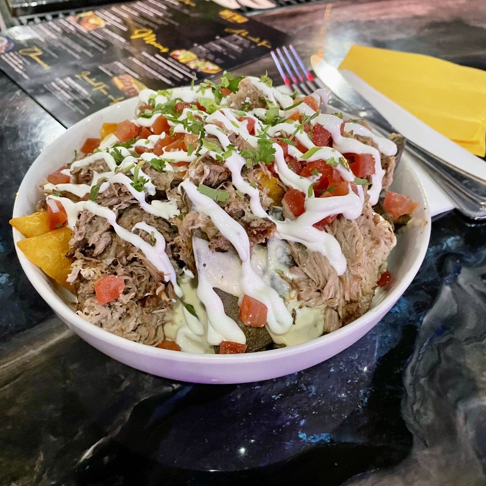 Casa Añejo - Carnitas nachos, hold the onions and guac. - Mexican Near Me - Caldwell, Idaho Casa Añejo - Carnitas nachos, hold the onions and guac. - Mexican Near Me - Caldwell, Idaho