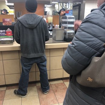 Wendy's - a man standing at a counter in a fast food restaurant - Fast Food Near Me - Centerville, Ohio Wendy's - a man standing at a counter in a fast food restaurant - Fast Food Near Me - Centerville, Ohio