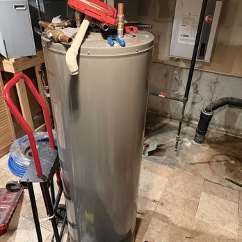 Ray's Heating and Cooling - Tank to tankless loading. Constant hot water say goodbye to cold showers. - Heating & Air Conditioning/HVAC Near Me - Bridgeport, Connecticut