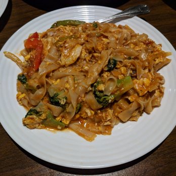 Siamese Basil Thai Restaurant - Drunken noodles. $8.89. Stir-fried Thai rice noodles, eggs, onions, bell peppers, broccoli, tomatoes, green string beans, fresh basil, meat. - Thai Near Me - Norcross, Georgia