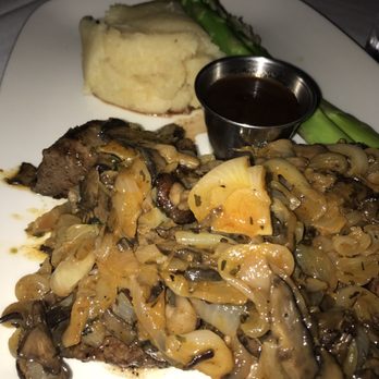 Delmonico's Steakhouse - Sautéed Roasted Mushrooms & Caramelized Sweet Onions on strip steak with Steamed Jumbo Asparagus & Roasted Garlic Mashers - Steakhouses Near Me - Independence, Ohio Delmonico's Steakhouse - Sautéed Roasted Mushrooms & Caramelized Sweet Onions on strip steak with Steamed Jumbo Asparagus & Roasted Garlic Mashers - Steakhouses Near Me - Independence, Ohio