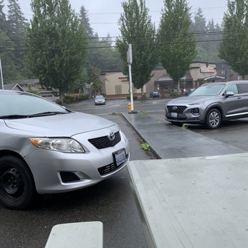 Herfy's - Parking lot view from outdoor seating. - Burgers Near Me - Edmonds, Washington