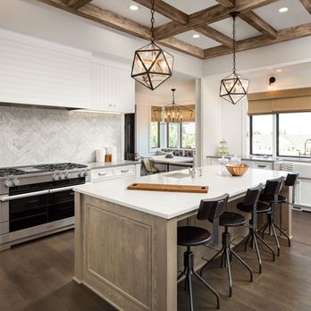 Top Renovation - a kitchen with a large island - General Contractors Near Me - Los Angeles, California Top Renovation - a kitchen with a large island - General Contractors Near Me - Los Angeles, California